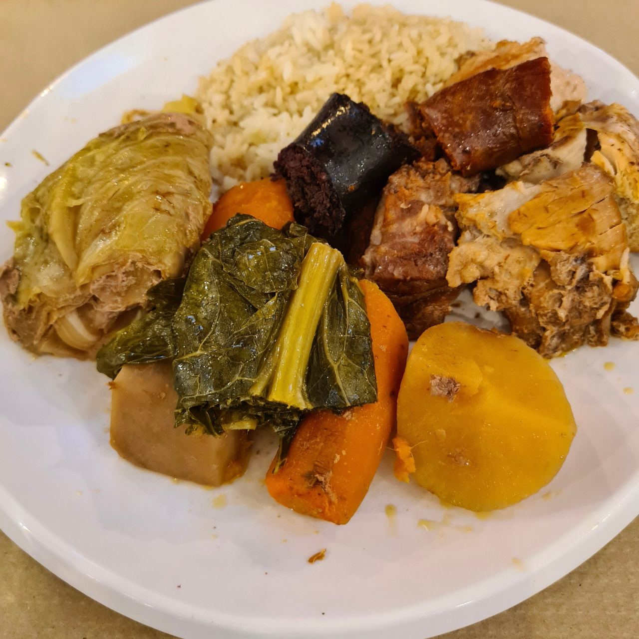 Azorean dish of rice, cooked meats, potato, cabbage and carrots