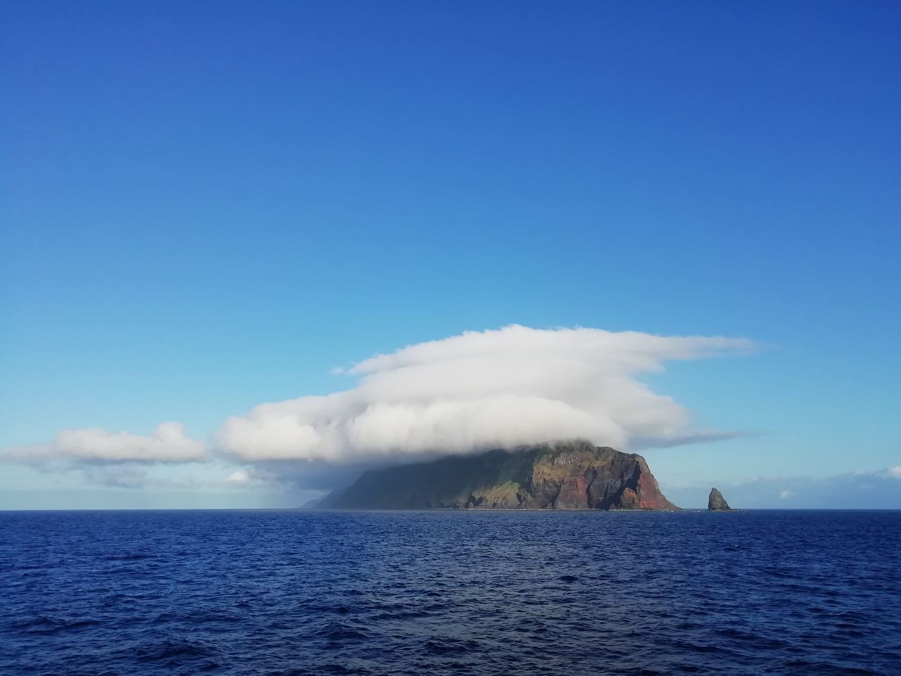 Atlantic island of São Jorge partially covered in clouds